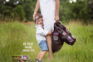 Caroline Knapp of HOUSE of HARPER announces baby #2 with a co-pilot photoshoot with her son, Knox.