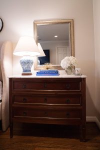 An antique marble top nightstand.
