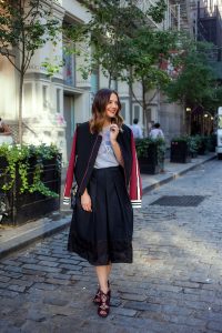 Caroline show how to style a bomber jacket for fall.