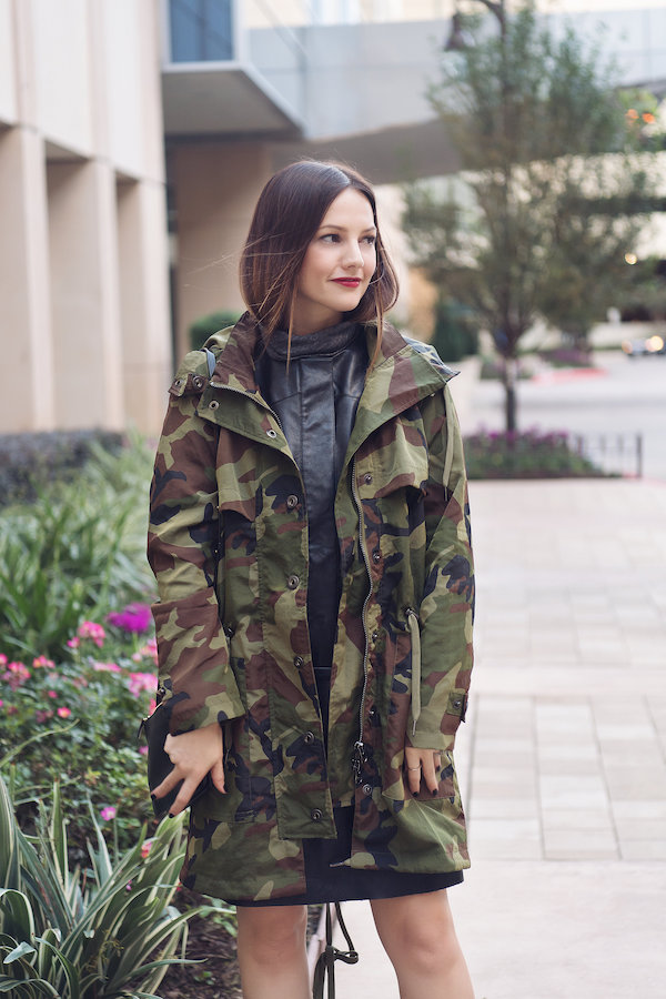 Caroline styles a pleather dress with camouflage print jacket for fall 