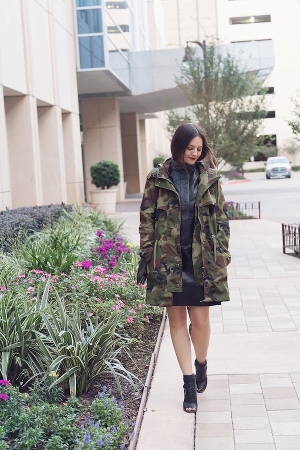 Caroline styles a pleather dress with camouflage print jacket for fall 