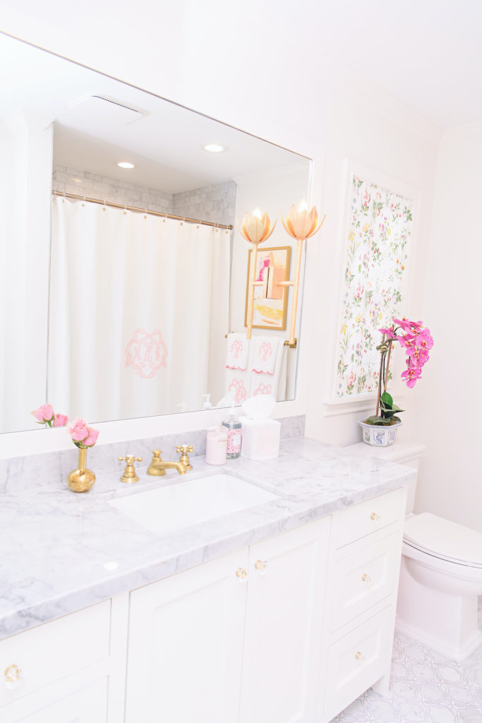 Caroline of House of Harper shares her daughter's bathroom complete with monogram towels and darling details!
